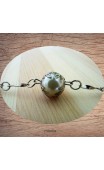 Maolia - Bracelet perles blanches et métal argenté.