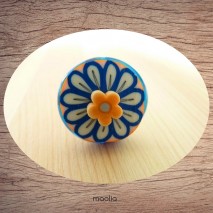 Bague bouton verre bleu et fleur en polymère